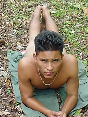 Sexy latino twink posing for the camera outdoors