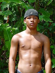 Sporty latino twink rubs his muscled ass outdoors