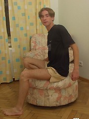 Twink grabs his crotch and poses for the camera