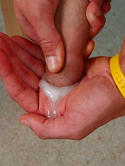 Ross plays with his uncut cock and squeezes out a load of cum in his hand for eating