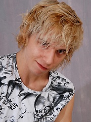Cute blonde teen boy exposes his slim body