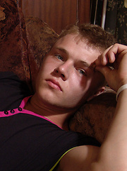 Muscled twink Alick rubs down his finely-tuned physique for the camera
